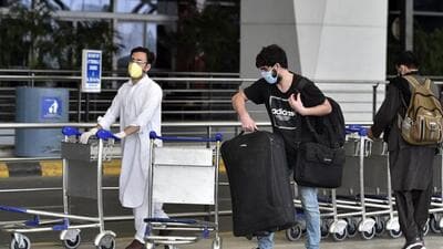 New Delhi, India - April 28, 2020: Passengers of special flight for Afghanistan wait at deserted departure terminal of T3, during national lockdown to curb the spread of coronavirus, at Indira Gandhi International (IGI) airport, in New Delhi, India, on Tuesday, April 28, 2020. (Photo by Ajay Aggarwal / Hindustan Times) (Ajay Aggarwal /HT PHOTO)