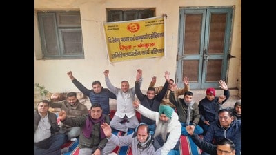 Patwaris and kanungos went on a three-day strike in Panchkula on Wednesday. The call for strike was given by the Revenue Patwar and Kanungo Association, Haryana, stalling the work in the revenue department. The protesters raised slogans against the government. (Sant Arora/HT)