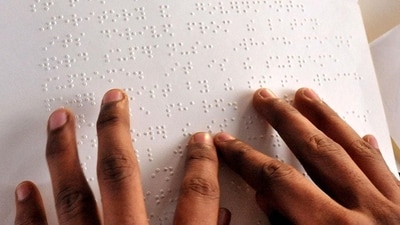 Recognition: Even though some people were against it at first, Braille's system eventually became popular and was officially accepted by the Institute in Paris in 1854, two years after he passed away. Today, Braille is used all over the world as the main way for blind and visually impaired people to read and write. (AFP) Recognition: Even though some people were against it at first, Braille's system eventually became popular and was officially accepted by the Institute in Paris in 1854, two years after he passed away. Today, Braille is used all over the world as the main way for blind and visually impaired people to read and write. (AFP)