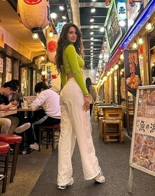 Disha Patani wears a green crop top and linen pants Disha Patani wears a green crop top and linen pants
