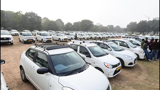 Drivers of nearly 500 taxis that ply in the tricity of Chandigarh, Panchkula and Mohali struck work and parked the cabs in the ground near Yadavindra Public School (YPS) Chowk in Mohali on Wednesday. (Ravi Kumar/HTT)