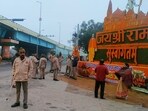 Police personnel keep vigil after security arrangements heightened before the arrival of Prime Minister Narendra Modi, in Ayodhya Police personnel keep vigil after security arrangements heightened before the arrival of Prime Minister Narendra Modi, in Ayodhya