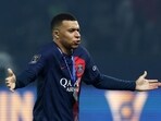 Paris St Germain's Kylian Mbappe celebrates after winning the Trophee des Champions