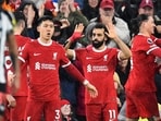 Mohamed Salah celebrates with teammates after scoring the opening goal of the English Premier League football match between Liverpool and Newcastle United at Anfield in Liverpool Mohamed Salah celebrates with teammates after scoring the opening goal of the English Premier League football match between Liverpool and Newcastle United at Anfield in Liverpool