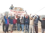 Truckers protesting on Agra-Lucknow Expressway in Mainpuri. (HT)