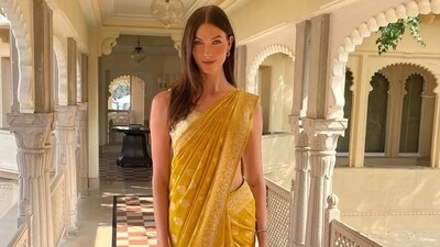 Karlie Kloss wore a yellow saree from Anita Dongre for a Haldi function in Udaipur.