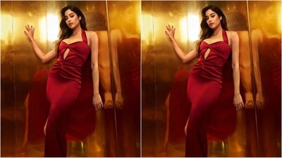 Jahnvi's sizzling red bodycon dress features luxurious satin fabric, a halterneck, a sweetheart neckline, a midriff cutout, a draped pattern at the waist, a bodycon fit and a stylish thigh high slit adding extra glamour to her look. (Instagram/@janhvikapoor)