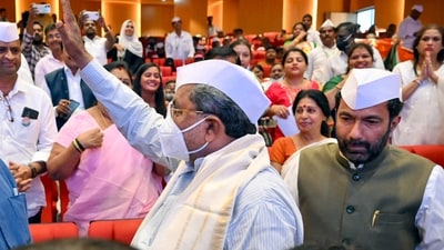 Karnataka Chief Minister Siddaramaiah waves to the crowd. (ANI Photo) (Arunkumar Rao) Karnataka Chief Minister Siddaramaiah waves to the crowd. (ANI Photo) (Arunkumar Rao)