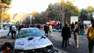 Two bombs exploded at a commemoration for a prominent Iranian general slain (AP) Two bombs exploded at a commemoration for a prominent Iranian general slain (AP)