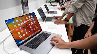 A woman spilled coffee on her MacBook and sued Apple. (AFP)