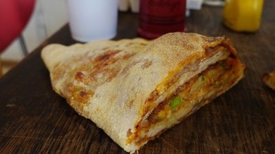 Calskrove from Sweden: This Swedish dish consists of a calzone pizza that is stuffed with hamburgers. It was invented a few years ago in the Swedish town of Skelleftea as the ultimate solution for people choosing between hamburgers and pizzas after a night out drinking. (Pinterest) Calskrove from Sweden: This Swedish dish consists of a calzone pizza that is stuffed with hamburgers. It was invented a few years ago in the Swedish town of Skelleftea as the ultimate solution for people choosing between hamburgers and pizzas after a night out drinking. (Pinterest)