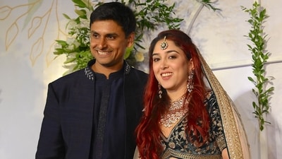 After officially becoming Mr and Mrs, Nupur Shikhare and Ira Khan came to meet the paparazzi stationed outside the venue. They happily posed for the shutterbugs. Ira looked gorgeous in a choli and dhoti pants. She elevated her wedding look with a net dupatta placed over her head. Nupur wore blue bandhgala. (AFP) After officially becoming Mr and Mrs, Nupur Shikhare and Ira Khan came to meet the paparazzi stationed outside the venue. They happily posed for the shutterbugs. Ira looked gorgeous in a choli and dhoti pants. She elevated her wedding look with a net dupatta placed over her head. Nupur wore blue bandhgala. (AFP)