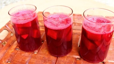 Usually made from black carrots, this vibrant red-hued probiotic drink promotes gut health, Usually made from black carrots, this vibrant red-hued probiotic drink promotes gut health,