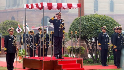 New Vice Chief of Naval Staff Dinesh K Tripathi inspects a Guard of Honour, in New Delhi. (PTI) New Vice Chief of Naval Staff Dinesh K Tripathi inspects a Guard of Honour, in New Delhi. (PTI)