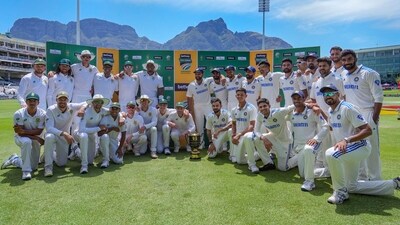 Indian and South African players pose with the trophy at the end of the 2-match Test cricket series, known as The Freedom Series, between India and South Africa, in Cape Town (PTI) Indian and South African players pose with the trophy at the end of the 2-match Test cricket series, known as The Freedom Series, between India and South Africa, in Cape Town (PTI)
