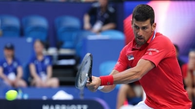 Serbia's Novak Djokovic hits a return against Australia's Alex de Minaur (AFP) Serbia's Novak Djokovic hits a return against Australia's Alex de Minaur (AFP)