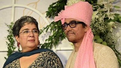 Aamir Khan's former wife Reena Dutta alseo posed with him at Ira Khan and Nupur Shikhare's wedding in Mumbai on Wednesday. Despite the divorce, the exes share a warm bond. She was earlier spotted in paparazzi videos and photos attending her daughter's pre-wedding functions. (AFP) Aamir Khan's former wife Reena Dutta alseo posed with him at Ira Khan and Nupur Shikhare's wedding in Mumbai on Wednesday. Despite the divorce, the exes share a warm bond. She was earlier spotted in paparazzi videos and photos attending her daughter's pre-wedding functions. (AFP)
