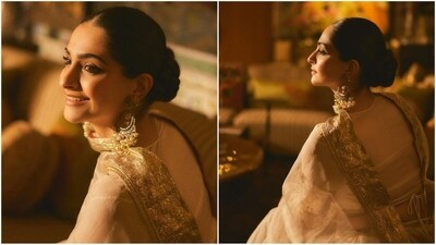 Sonam styled her lush locks into a neat low bun that perfectly complemented her traditional look. Exuding grace and elegance, Sonam serves up fashion inspiration for the Indian wedding season. (Instagram/@sonamkapoor) Sonam styled her lush locks into a neat low bun that perfectly complemented her traditional look. Exuding grace and elegance, Sonam serves up fashion inspiration for the Indian wedding season. (Instagram/@sonamkapoor)