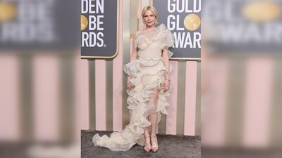 Michelle Williams stunned in a beige ruffle Gucci one-shoulder gown, paired with minimal jewellery that complemented her elegant look. (Pinterest) Michelle Williams stunned in a beige ruffle Gucci one-shoulder gown, paired with minimal jewellery that complemented her elegant look. (Pinterest)