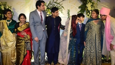 Other members of the couple's family also marked their presence and posed for the paparazzi. Aamir Khan opted for a cream-coloured sherwani and a pink turban. Aamir's first wife Reena Dutta, ex-wife Kiran Rao and sons Junaid Khan and Azad also posed for family pics. (Varinder Chawla) Other members of the couple's family also marked their presence and posed for the paparazzi. Aamir Khan opted for a cream-coloured sherwani and a pink turban. Aamir's first wife Reena Dutta, ex-wife Kiran Rao and sons Junaid Khan and Azad also posed for family pics. (Varinder Chawla)
