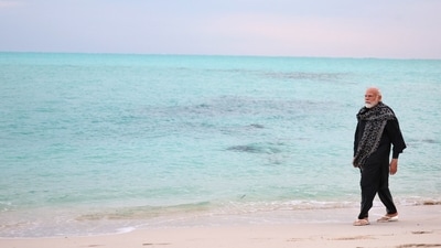 PM Modi also shared pictures of his early morning walks on the pristine beaches of Laskhadweep. In one picture, he can also be sitting on a chair by the beach. “And those early morning walks along the pristine beaches were also moments of pure bliss,” he captioned the pictures. (Twitter/@narendramodi) PM Modi also shared pictures of his early morning walks on the pristine beaches of Laskhadweep. In one picture, he can also be sitting on a chair by the beach. “And those early morning walks along the pristine beaches were also moments of pure bliss,” he captioned the pictures. (Twitter/@narendramodi)