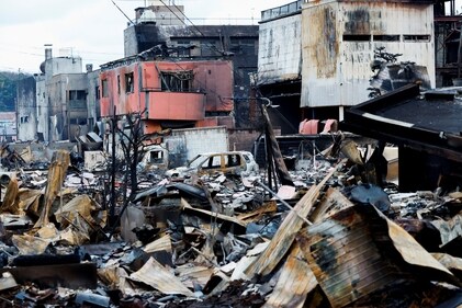 Debris accumulates along Asaichi-dori street, which burned down due to a fire following an earthquake, in Wajima, Japan, January 4, 2024. (Reuters)