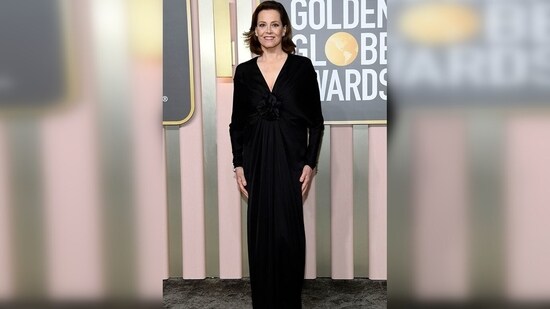 Sigourney Weaver epitomized elegance in a black Yves Saint Laurent dress, adorned with a stunning rosette at the centre.&nbsp;(Pinterest)