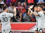 Kylian Mbappe celebrates with Neymar and Lionel Messi. Kylian Mbappe celebrates with Neymar and Lionel Messi.