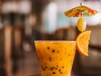 Try a splash of fresh orange in a Negroni to soften it or even a frozen sphere of fresh orange juice.