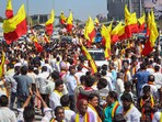 Bengaluru: Activists of the Karnataka Rakshana Vedike (Narayana Gowda faction) during a rally over the 60 per cent Kannada sign board rules, in Bengaluru, Wednesday, Dec. 27, 2023. The organisation on Wednesday targeted business establishments in Bengaluru and damaged their signboards and name plates which did not use Kannada. (PTI Photo) (PTI12_27_2023_000190B)(PTI)