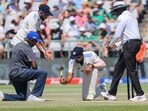India attempt to flatten out a problem area on the pitch during the second day of the second Test vs South Africa in Cape Town