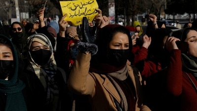 Afghan women chant slogans in protest against the closure of universities to women by the Taliban in Kabul, Afghanistan, December 22, 2022. (REUTERS )