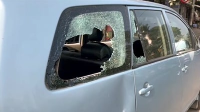 North 24 Parganas: The windows of a vehicle in which a team of the Enforcement Directorate (ED) was traveling are broken after it was attacked during a raid in West Bengal's Sandeshkhali. (ANI) North 24 Parganas: The windows of a vehicle in which a team of the Enforcement Directorate (ED) was traveling are broken after it was attacked during a raid in West Bengal's Sandeshkhali. (ANI)