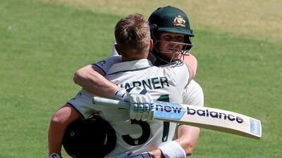 David Warner (L) celebrates his century with teammate Steve Smith during the first day of the first Test cricket match between Australia and Pakistan (AFP) David Warner (L) celebrates his century with teammate Steve Smith during the first day of the first Test cricket match between Australia and Pakistan (AFP)