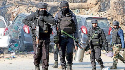 Security personnel patrol the encounter site at Chotigam in Shopian on Friday (ANI) Security personnel patrol the encounter site at Chotigam in Shopian on Friday (ANI)