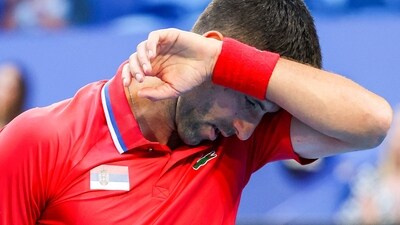 Serbia's Novak Djokovic reacts during his men's singles match against Australia's Alex de Minaur. (AFP) Serbia's Novak Djokovic reacts during his men's singles match against Australia's Alex de Minaur. (AFP)