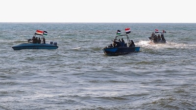 Members of the Yemeni Coast Guard affiliated with the Houthi group patrol the sea as demonstrators march through the Red Sea port city of Hodeida in solidarity with the people of Gaza. (AFP) Members of the Yemeni Coast Guard affiliated with the Houthi group patrol the sea as demonstrators march through the Red Sea port city of Hodeida in solidarity with the people of Gaza. (AFP)