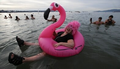 A participant celebrates New Year’s Day in Vancouver, Canada |  Photos: REUTERS and AFP
