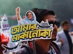 A student holds a placard of Prime Minister Sheikh Hasina as they celebrate the formation day of Bangladesh Chhatra League, the student wing of Bangladesh Awami League, at the University of Dhaka.