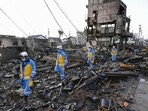 Police officers conduct a search operation at a burnt market in Wajima, Ishikawa prefecture, Japan. Police officers conduct a search operation at a burnt market in Wajima, Ishikawa prefecture, Japan.