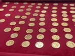 A treasure trove of at least 240 colonial-era gold coins seemingly emerged from the timeworn walls