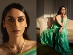 Manushi Chhillar in a green Banarasi satin silk saree with tropical leaf detail by designer and handloom revivalist Vidhi Singhania. She spruced up her look with ghungroo, a statement neckpiece and a ring by jewellery designer Amber Paridhi Sahai. 