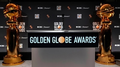 Replicas of Golden Globe statues appear behind the podium at the nominations for the 81st Golden Globe Awards at the Beverly Hilton Hotel on Monday, Dec. 11, 2023, in Beverly Hills, Calif. The 81st Golden Globe Awards will be held on Sunday, Jan. 7, 2024. (AP Photo/Chris Pizzello) (Chris Pizzello/Invision/AP)