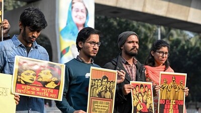 Bangladesh Elections: Dhaka University students hold a rally along a roadside in the capital. (AFP) Bangladesh Elections: Dhaka University students hold a rally along a roadside in the capital. (AFP)