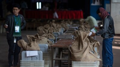 Bangladesh Elections: Workers prepare ballot boxes for distribution in an auditorium of a school in Dhaka, Bangladesh. (AP) Bangladesh Elections: Workers prepare ballot boxes for distribution in an auditorium of a school in Dhaka, Bangladesh. (AP)