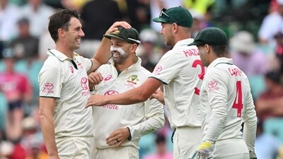 Australia's Pat Cummins (L) celebrates the wicket of Pakistan's Sajid Khan with teammates during the first day of the third cricket Test match against Australia at the Sydney Cricket Ground (AFP) Australia's Pat Cummins (L) celebrates the wicket of Pakistan's Sajid Khan with teammates during the first day of the third cricket Test match against Australia at the Sydney Cricket Ground (AFP)