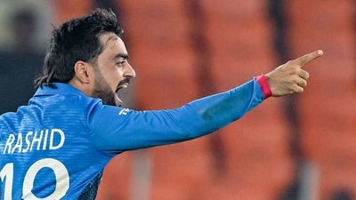Afghanistan's Rashid Khan celebrates after taking the wicket of South Africa's Heinrich Klaasen during the 2023 ICC Men's Cricket World Cup (AFP) Afghanistan's Rashid Khan celebrates after taking the wicket of South Africa's Heinrich Klaasen during the 2023 ICC Men's Cricket World Cup (AFP)