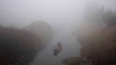 A thin layer of ice formed on the surface of the Dal Lake here and other water bodies in Kashmir as cold wave-like conditions gripped the region, officials said on Saturday. (AP) A thin layer of ice formed on the surface of the Dal Lake here and other water bodies in Kashmir as cold wave-like conditions gripped the region, officials said on Saturday. (AP)