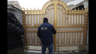 National Investigation Agency (NIA) attaches the house of Mushtaq Ahmad in Srinagar, India on 06 January 2024. NIA spokesman said that the property of Mushtaq Ahmad in Chanapora area of Srinagar was attached in recovery of arms and ammunition case. In the past many houses have been attached by the security agencies in Kashmir. (Waseem Andrabi /HT Photo) National Investigation Agency (NIA) attaches the house of Mushtaq Ahmad in Srinagar, India on 06 January 2024. NIA spokesman said that the property of Mushtaq Ahmad in Chanapora area of Srinagar was attached in recovery of arms and ammunition case. In the past many houses have been attached by the security agencies in Kashmir. (Waseem Andrabi /HT Photo)