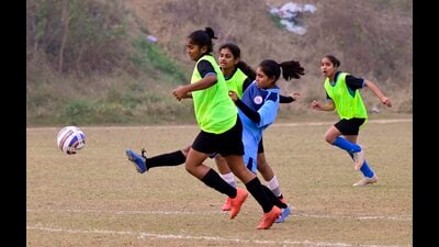 Players in action during the football match between Andhra Pradesh and Madhya Pradesh during the 67th School National games held in Ludhiana. (HT) Players in action during the football match between Andhra Pradesh and Madhya Pradesh during the 67th School National games held in Ludhiana. (HT)